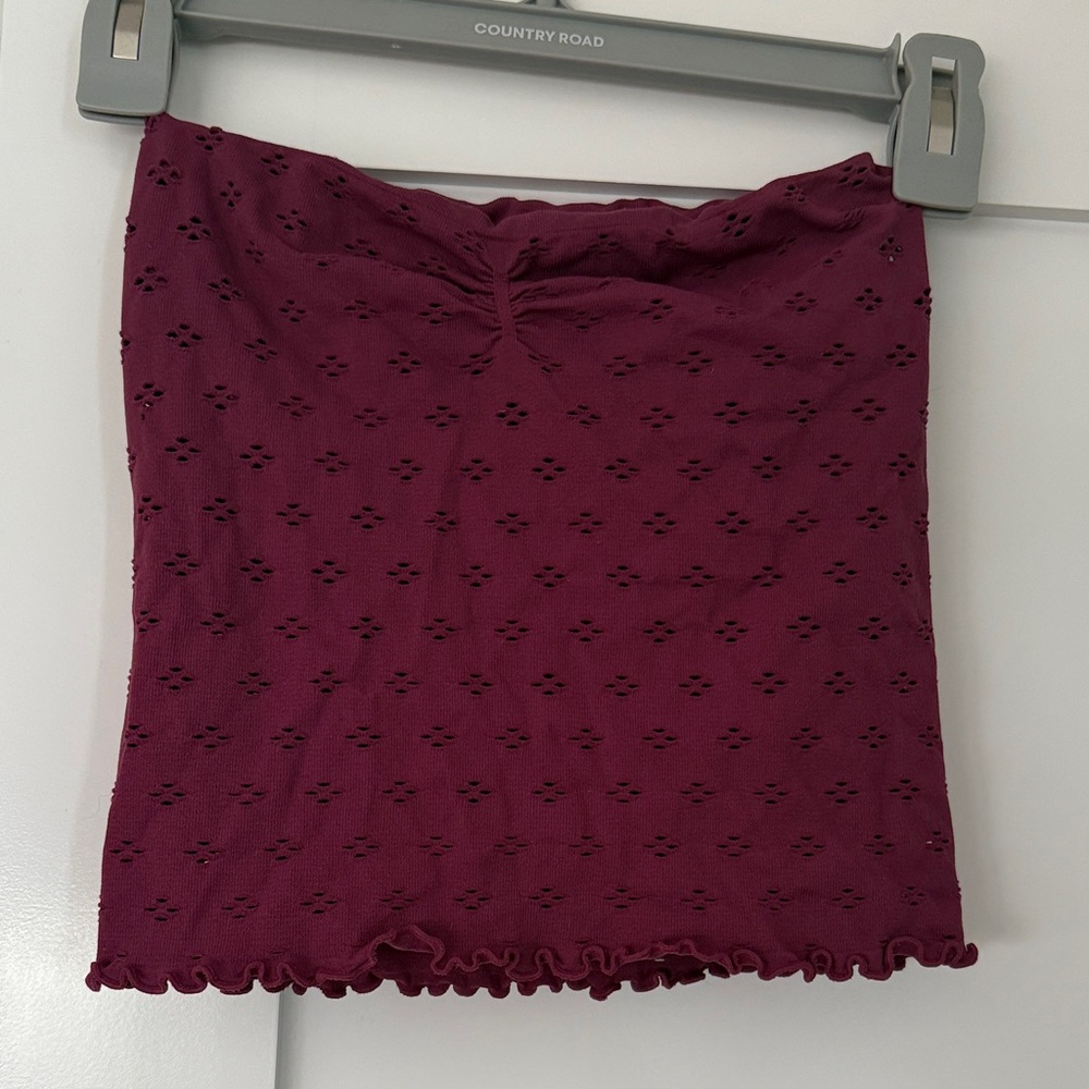 Two FP tanks. Free people intimates strapless tank & free people green tank.